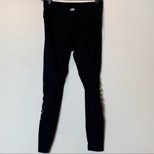 EUC Marika criss cross leg cutout‎ athletic leggings